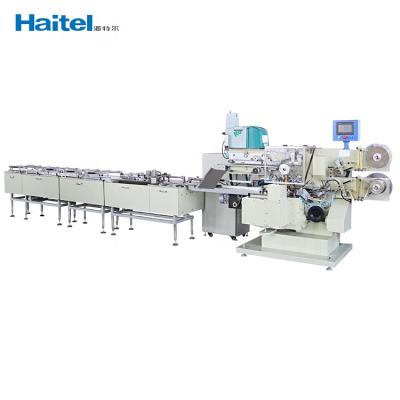 China Food Chocolate Packing Machine Chocolate Arranging Fold Wrapping Machine for sale