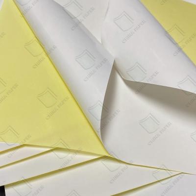 China Customized 40/50/60GSM Yellow / White Sticker Silicone Coated Self Adhesive Release Glassine Paper For Stickers for sale