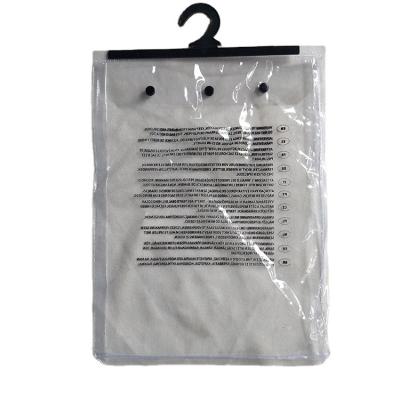 China Clear Safety Double Closure Hanger Hook Plastic Bags With Snap Button for sale