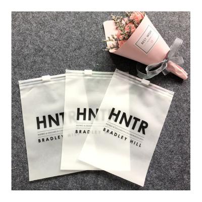 China Security Customized Frosted Logo PVC Apparel Packaging Bag Plastic Zipper Bag For T-shirt Swimwear Cloth for sale