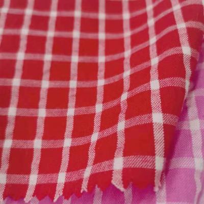 China Ready viable cheap price in stock cotton yarn dyed plaids screen cotton seersucker crepe woven fabric for childern clothing for sale