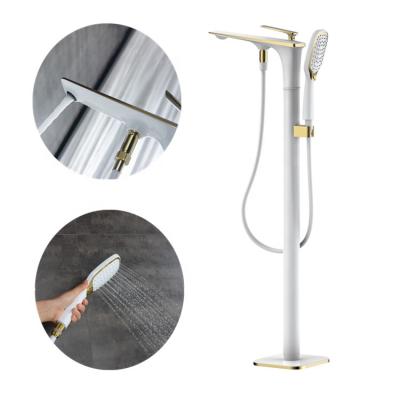 China White Gold Bath Shower Mixer Taps Brass Floor Mounted Free Standing Bathtub Faucet Modern Luxury Hot And Cold Floor Mounted Faucets for sale