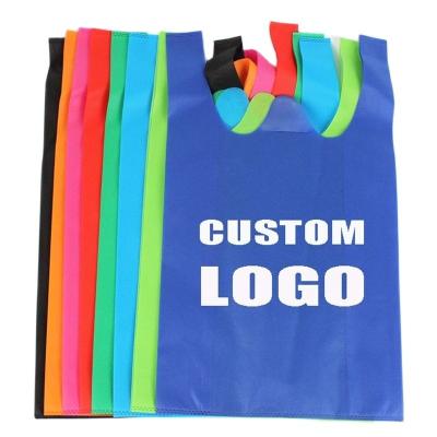 China Eco-friendly Custom Foldable Reusable Biodegradable Vest Shopping Bag Non-Woven Tote Bag Non Woven T Shirt Bag for sale