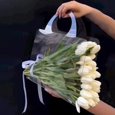 China Recyclable Tiktok Hot Selling 2023 Gift Shopping Bag PVC PET Plastic Bags Transparent Flower Bouquet Packaging Gift Bag with Ribbon for sale