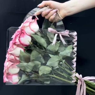 China Recyclable Tiktok Hot Selling 2023 Transparent Portable Flower Bouquet Sleeves Bag Plastic Flower Carrier Bags for sale