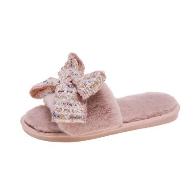 China CUSHIONING Fur Slippers 2021 New Outdoor Plush Indoor Fashion Girls Bow Tie Women's Bedroom Fur Slippers for sale