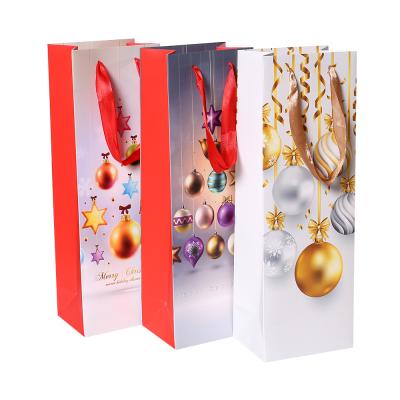 China Santa Claus Xmas Decoration Gift Christmas Recyclable Red Paper Bag For Packaging for sale