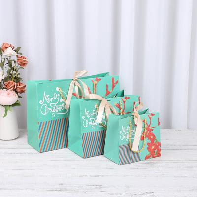 China Recyclable Manufactures Gift Wrapping Craft Paper Bag Christmas Paper Bag 2021 for sale