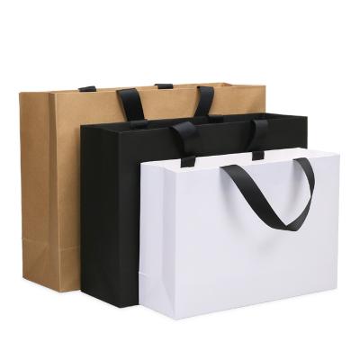 China Recyclable Customized Luxury Gift Boutique Paper Bag Shopping Bag With Logo for sale