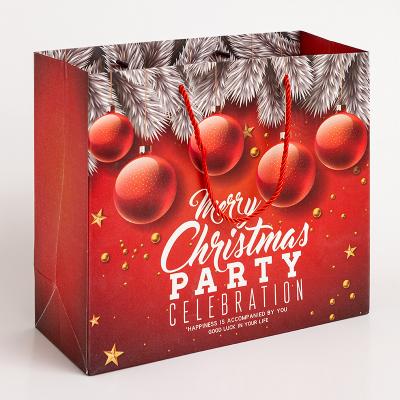 China Recyclable Red Whole Sale Personalize Large Christmas Paper Bags With Handles for sale