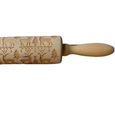 China Deer Rolling Pin Embossing Baking Cookies Noodle Wooden Dough Patterned Roller Snowflake for sale