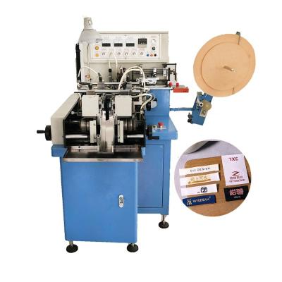 China Factory hot sale printed fabric label satin ribbon cutting and folding machine for sale