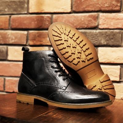 China 2021 Craft Italian Luxury Leather Boots Men's Martin Boots Waterproof Exquisite Cut Out Brogues for sale