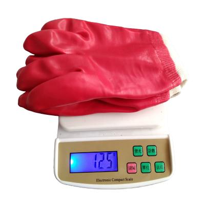 China Durable Red PVC Work Glove With Interlock Liner And Knit Wrist for sale