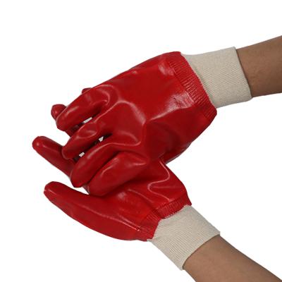 China Durable Cotton Short White Cuff Red PVC Fully Dipped Knit Wrist Chemical Work Gloves for sale