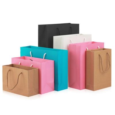 China 2022 Custom Recyclable Gift Bags Paper Bags With Handles Wholesale Paper Bag With Your Own Logo for sale