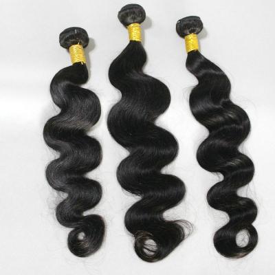 China Unprocessed Indian Raw Human Hair 10-30inches Body Wave Hair Bundle Double Weft Machine Weft for sale