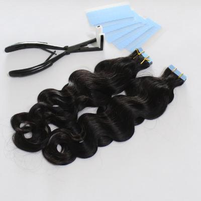 China Body Wave Body Wave Tape In Natural Wavy Hair Extension 100% Indian Raw Virgin Hair Color for sale