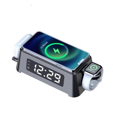 China Mobile Phone 4 in 1 Wireless Charger Qi Multifunction Alarm Clock Mobile Phone PC Fireproof Waterproof 4-digit Time Display Material for sale