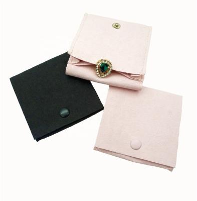 China Jewelry Packaging Micro Small Jewelry Pouches High Quality Cloth Jewelry Pouches Suede Cloth Packaging Pouch With Button for sale