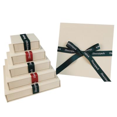 China Gift & Craft Ribbon Luxury Paper Canvas Gift Box With Magnet Closure Cardboard Box Packaging for sale