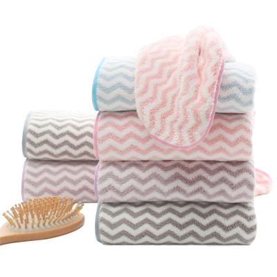 China Sustainable Hotel Wrap Bath Towel Kids Fine Fiber Fleece Swimming Coral Bath Towel for sale