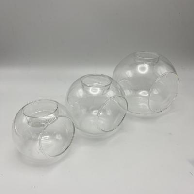 China Modern Art Unique Wholesale Glass Candle Holder Large Camping Glass Candle Holders for sale