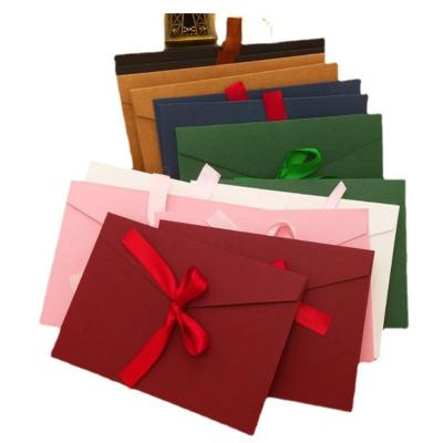 China Modern Luxury Hot Selling Fancy Fancy 12 Colors DL/C6 Sizes Envelopes With Ribbon Paper Mailing Envelope For Invitation Weeding Packaging for sale