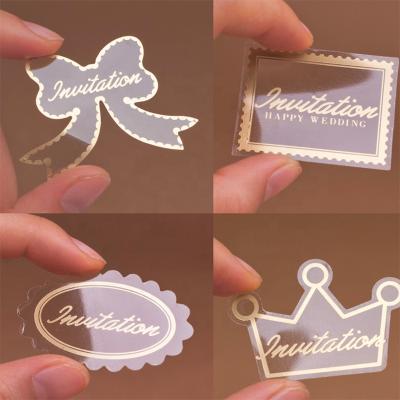 China Custom Transparent Gold Foil Waterproof Logo Sticker Packaging Vinyl Clear Lable for sale