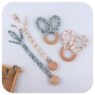 China Toy Baby Shower Gift Soft Hand-Woven Mixed Color Pacifier Anti Rope Chain Teether Set Wooden Teether Ring Pacifier Holder Dummy Chain for sale