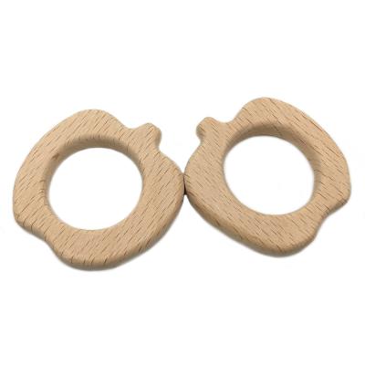 China Eco-friendly Hot Sale Natural Color Baby Wooden Fruit Apple Shaped Beech Wooden Teether Teether for sale