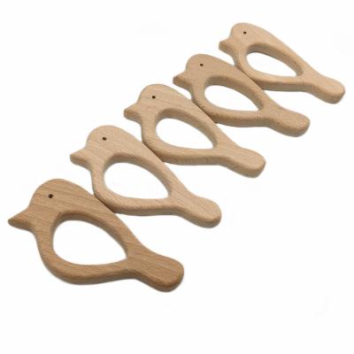 China Safety New Eco-friendly Beech Wood Swallow Shapes Natural Beech Wood Baby Teether for sale