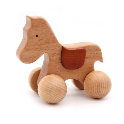 China Eco-Friendly Organic Wood Montessori Styled Pony Car Baby Rattle Grasping Wooden Teether Toy for Toddlers Natural Toys for sale