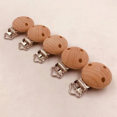 China BPA Free 30mm Beech Wood Wooden Baby Teething Pacifier Simple Round Metal Clip for sale