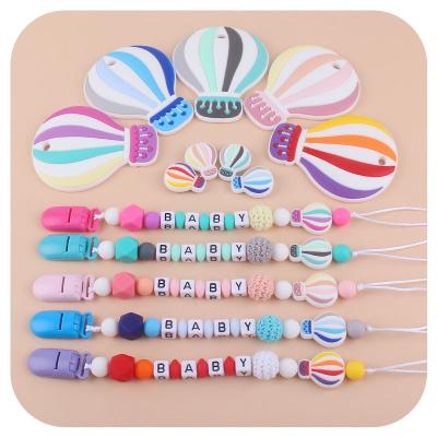 China Toy Custom Food Grade Baby Hot Air Balloon Pacifier Clip Chain Soft Infant Dummy for sale