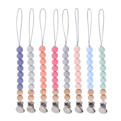 China Toy New Arrivals Amazon Hot Selling Soother Baby Pacifier Clip Soft Wooden Baby Soother Dummy Pacifier Chain Clip With Baby Teether for sale