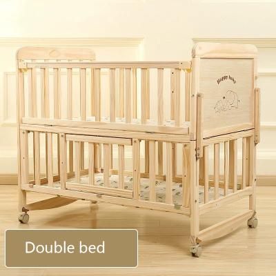 China Modern Solid Wood Multifunctional Newborn Crib Baby Huts Quilting Large Bed Baby Crib for sale