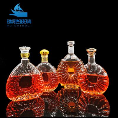 China 500ml Soft Drink Bottle Glass Water Liquor Bottle with Cap Seal in Super Flint Glass for sale