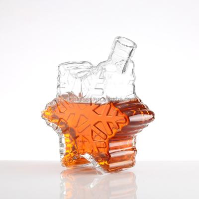 China Base Material Super Flint Glass Unique Star Design Glass Bottle for Luxury Whisky Vodka for sale