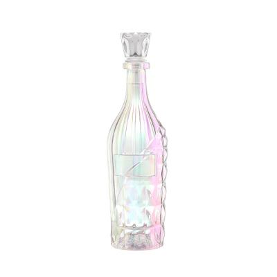 China Customized Hot Stamping 200ml 375ml 500ml 750ml Round Glass Liquor Bottle for sale