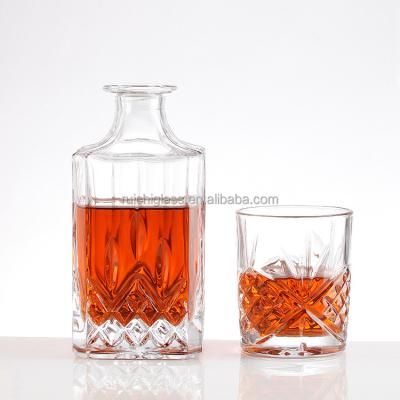 China 500ml 750ml Whiskey Customized Transparent Glass Bottle with Aluminum Plastic PP Cap for sale