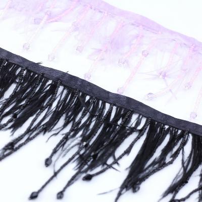 China Attractive wholesale long purple feather beaded trim and fringes for belly dancing for sale