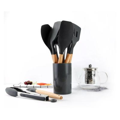 China Cheap 12 Pcs Viable Handle Kitchen Tools Black Wooden Silicone Cooking Set With Wooden Handle for sale