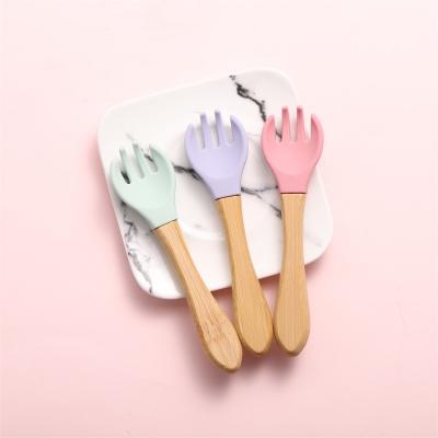 China Hot Selling BPA Free Amazon Silicone Baby Spoon Safety BPA Free Mini Feeding Wooden Spoon Fork Set Cucharas Set For Training for sale