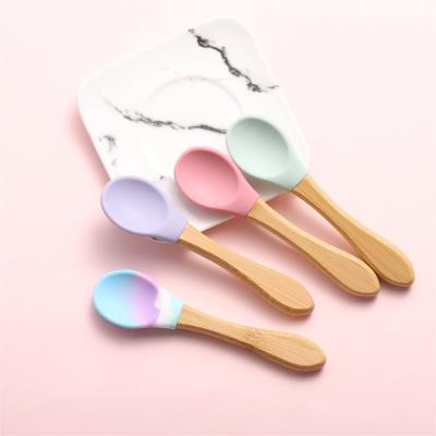 China Hot Sale BPA Free Eco-Friendly Giraffe Shape Chewing Silicone Baby Training Spoon And Fork for sale