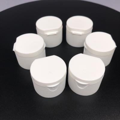 China 24mm lid 24/410 bottle cap plastic caps ribbed flip top cap for sale