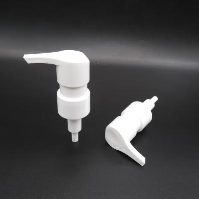 China 24/410 plastic white PP new shape left right lock switch lotion dispenser pump for bottle Te koop