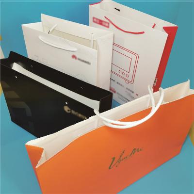 China Economical Custom Design Handle Paper Bags Kraft Paper Kraft Paper Bags Logo Paper Bag for sale