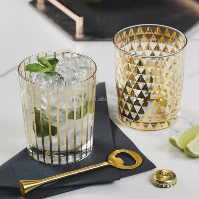 China Gorgeous wine gold stripe and geometric triangle printed design gold patterned drinking glasses for barware collection for sale