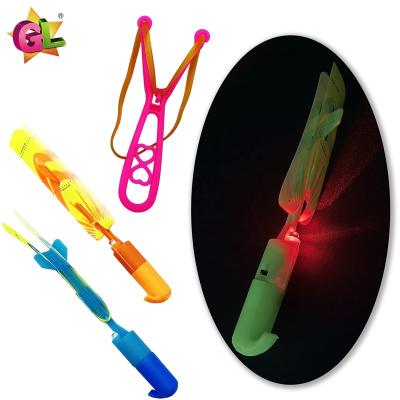 China Plastic Light up toys wholesale led flying helicopter toys flashing arrow hand launch kids outdoor finger rocket for sale